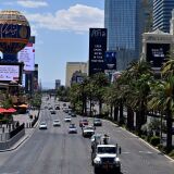 LAS VEGAS, NEVADA - JUNE 04: Vehicle traffic moves along the Las Vegas Strip as casinos are beginning to open for the first time since being closed on March 17 because of the coronavirus (COVID-19) pandemic, on June 4, 2020 in Las Vegas, Nevada. Hotel-casinos throughout the state are opening today as part of a phased reopening of the economy with social distancing guidelines and other restrictions in place. (Photo by David Becker/Getty Images)