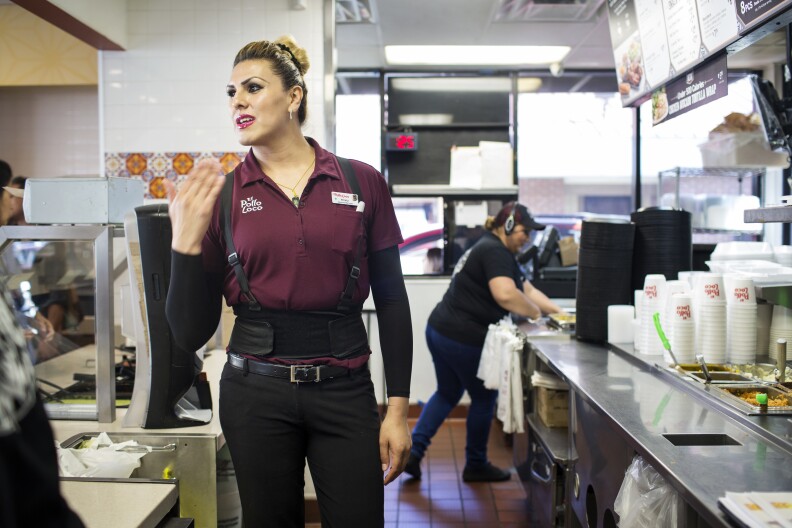 General Manager Kristy Ramirez helps a customer order at one of Michaela Mendelsohn's six El Pollo Loco franchises she owns in Southern California on Wednesday afternoon, July 14, 2016.