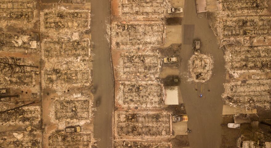 In this aerial photo, a burned neighborhood is seen in Paradise, California, which was devastated by a massive fire in 2018.