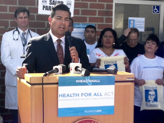 State Sen. Ricardo Lara (D-Long Beach) introducing SB 1005 at a news conference outside Clinica Oscar Romero in Boyle Heights in February.