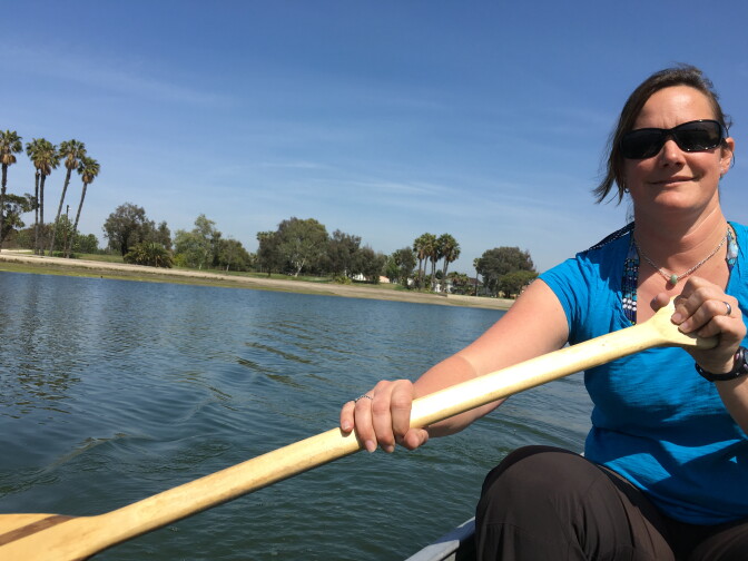 CSULB researcher and professor Christine Whitcraft paddles out to pick up sensors that monitor the Colorado Lagoon in Long Beach.