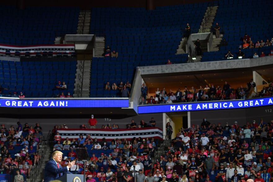 The upper section of the arena is seen partially empty as US President Donald Trump speaks during a campaign rally at the BOK Center on June 20, 2020 in Tulsa, Oklahoma. - Hundreds of supporters lined up early for Donald Trump's first political rally in months, saying the risk of contracting COVID-19 in a big, packed arena would not keep them from hearing the president's campaign message. (Photo by Nicholas Kamm / AFP) (Photo by NICHOLAS KAMM/AFP via Getty Images)