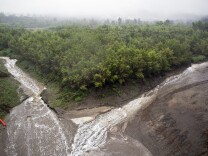 File: Water flows at Devil's Gate Dam in Pasadena on Tuesday morning, Sept. 15, 2015.