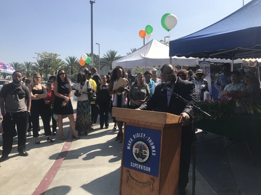 District Supervisor Mark Ridley-Thomas speaks at the opening of the farmers market.