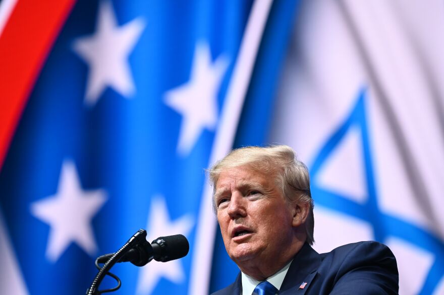 US President Donald Trump addresses the Israeli American Council National Summit 2019 at the Diplomat Beach Resort in Hollywood, Florida on December 7, 2019. (Photo by MANDEL NGAN / AFP) (Photo by MANDEL NGAN/AFP via Getty Images)