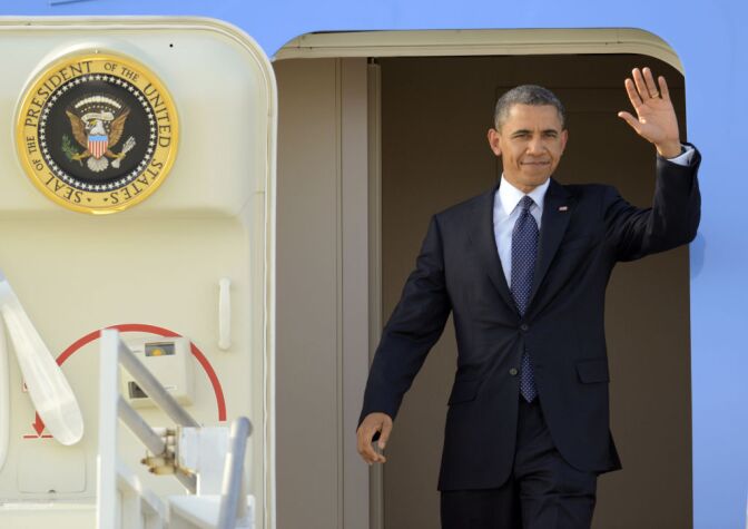 President Barack Obama waves as he arrives at Los Angeles International Airport, Thursday, May 10, 2012, in Los Angeles. Obama is traveling to the West Coast for a series of campaign fundraisers. (AP Photo/Mark J. Terrill)