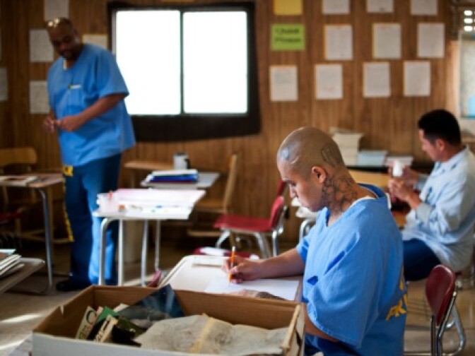 State prison inmates Earl Stewart, left, Ricardo Castillo and Jesus Ledesma take part in a painting class on Tuesday, Nov. 19 at Norco's California Rehabilitation Center.