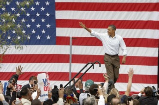 President Barack Obama takes to the stage prior to speaking at a Labor Day event sponsored by the Metro Detroit Central Labor Council on September 5, 2011 in Detroit, Michigan.