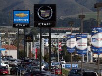 When loan rates do rise there's no getting around that only hurts sales, but the good news for automakers is that it is an indication of a stronger economy. (Photo: New cars sit on the sales lot of a Chevrolet dealership in Colma, Calif.)
