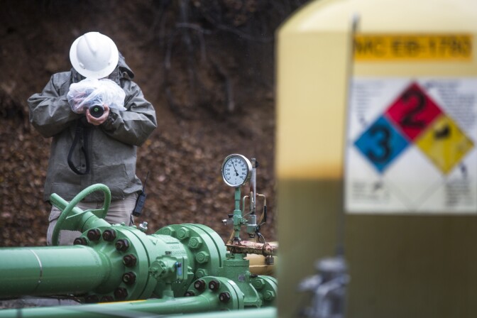 Officials from the Department of Conservation's Division of Oil, Gas and Geothermal Resources and California Public Utilities Commission demonstrate an infra-ref camera during a media event at the Aliso Canyon Natural Gas Storage Facility near Porter Ranch on Thursday, Jan. 12, 2017. The cameras are part of several new safety enhancements being made at the facility following a massive natural-gas leak at the facility in 2015.
