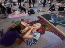 With approximately 600 participating visual artists from all over Southern California, The Pasadena Chalk Festival has grown to become the largest street painting festival in the world