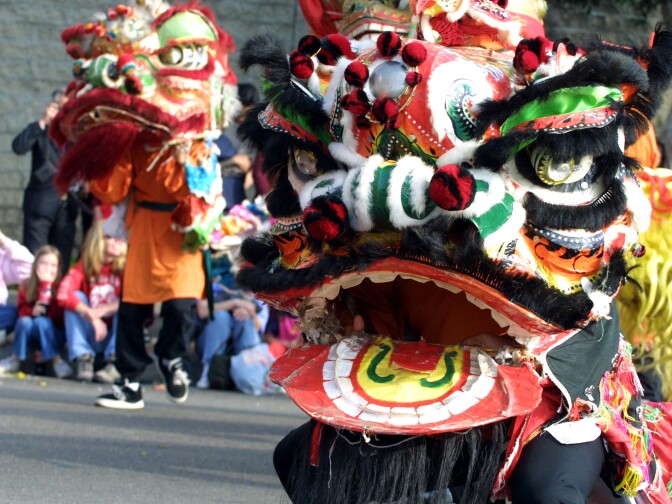 People participate in the Golden Dragon Parade in Chinatown in Los Angeles during the annual celebration of the Lunar New Year.