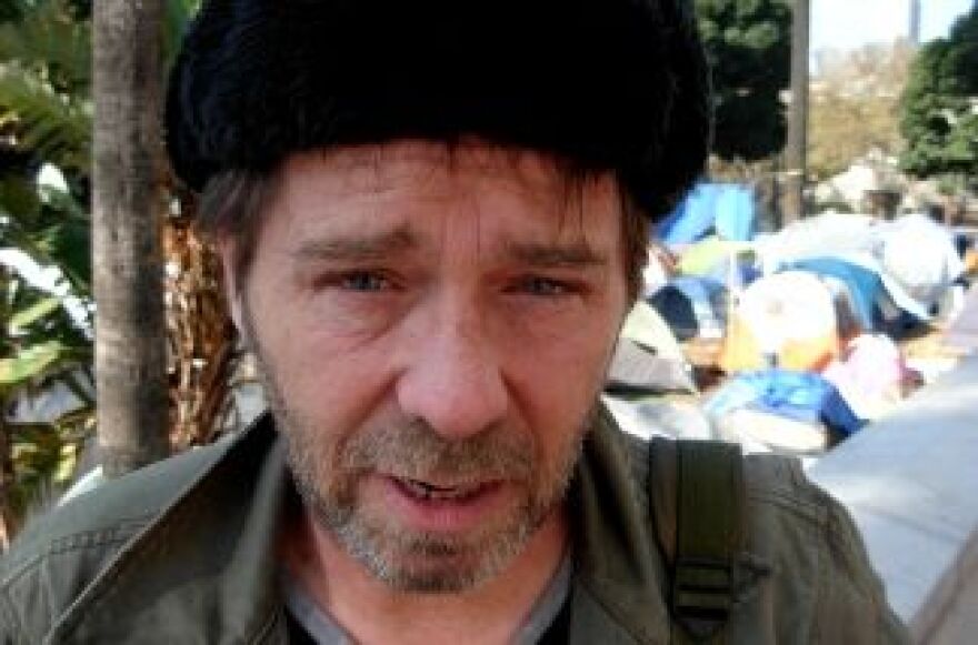 Sam Slovick, transmedia journalist, pitches his tent at Occupy LA and is Off-Ramp's Virgil in the chaos. (LA City Hall, 11-8-2011.)