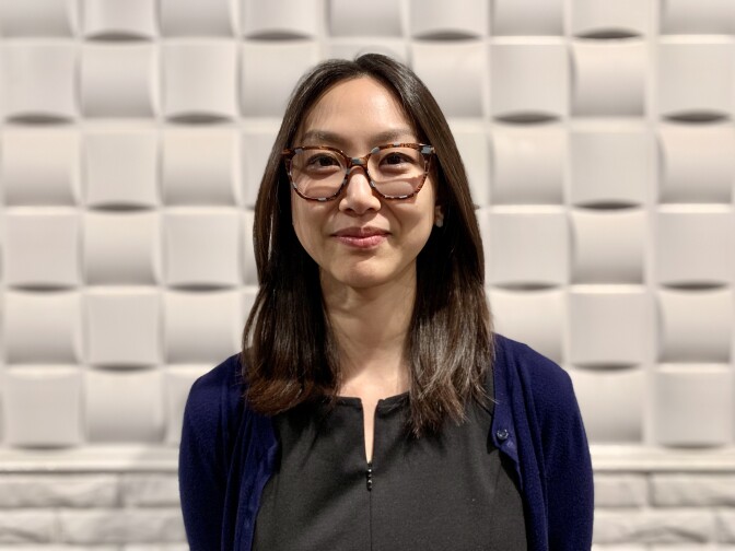 Photo of 32-year-old Taiwanese American woman with long hair and glasses
