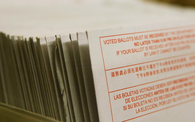 File: A stack of vote-by-mail ballots sit in a box after being sorted at the San Francisco Department of Elections January 24, 2008 in San Francisco, California. 