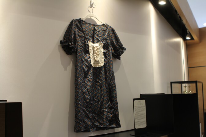 A donated dress hangs in the Museum of Broken Relationships in Los Angeles, Calif. 