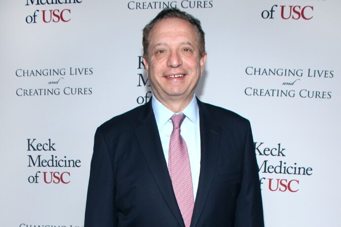 File: Carmen A. Puliafito, M.D., M.B.A. arrives at Changing Lives And Creating Cures Gala at The Beverly Wilshire Hotel on Thursday, Nov. 20, 2014, in Beverly Hills.
