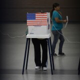 Sun Valley residents vote at the polling station located at Our Lady of The Holy Church on election day at the Sun Valley's Latino district, Los Angeles County, on November 6, 2012 in California.AFP PHOTO /JOE KLAMAR        (Photo credit should read JOE KLAMAR/AFP/Getty Images)