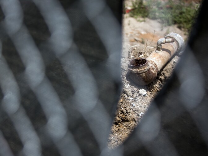 An old steel mill and truck repair facility, where lead and other toxins have been found, sits adjacent to Jordan Downs Housing Projects. The Department of Toxic Substances Control has agreed to review their decision that no cleanup was necessary.