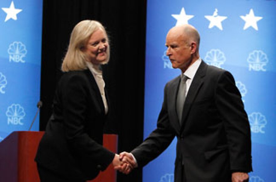 Republican gubernatorial candidate and former eBay CEO Meg Whitman (L) and Democratic gubernatorial candidate and California State Attorney General Jerry Brown shake hands at the conclusion of a debate October 12, 2010 at Dominican University of California in San Rafael, California.