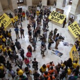 WASHINGTON, DC - JUNE 25: Protestors hold a demonstration against U.S. Customs and Border Patrol funding during a rally inside the Russell Senate Office Building Rotunda on June 25, 2019 on Capitol Hill in Washington, DC. House Democrats say they want to provide aid for the care of illegal immigrant children and other services for detained immigrants, but exclude additional money for border enforcement and for additional beds in detention centers, according to published reports.  (Photo by Tom Brenner/Getty Images)