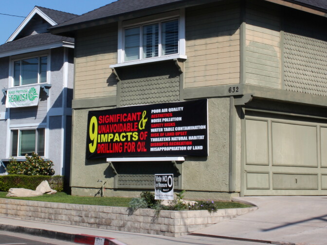 An active environmental opposition stretches along the Santa Monica Bay. This sign quotes the environmental impact report's assessment that slant drilling from Hermosa Beach would have "significant and unavoidable" risks. 