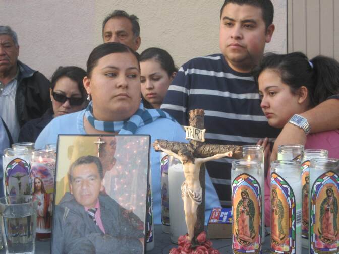 Friends and family members at a vigil for Mario Deleon Rivera.   