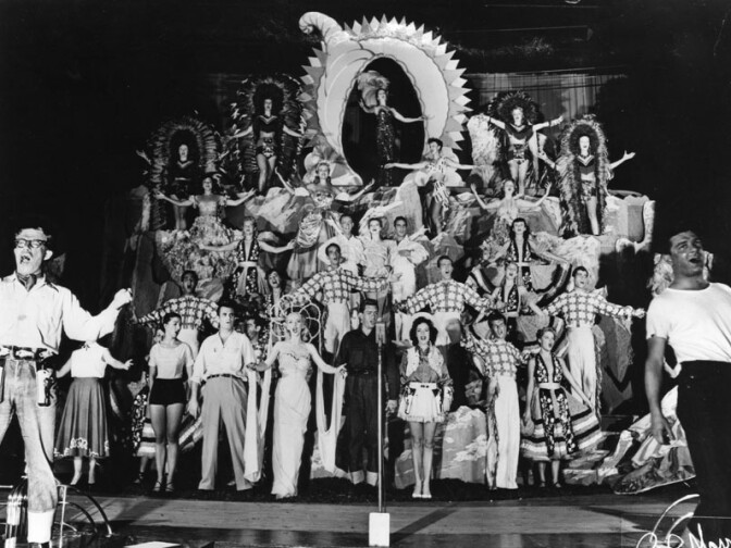An undated photo showing a cast of singers on stage at the Earl Carroll Theatre. 