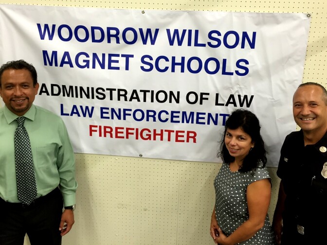 Wilson High Principal Luis Lopez, magnet coordinator Maribel Gonzalez, and LA Fire Captain Eddie Marez, alum of Wilson High and a teacher in the brand new firefighting magnet school.