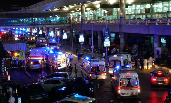 Security and ambulances block the road outside Turkey's largest airport, Istanbul Ataturk, after it was hit by a suicide bomb attack on June 28, 2016, Turkey. 