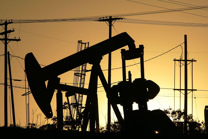 CULVER CITY, CA - APRIL 25:  Oil rigs extract petroleum as the price of crude oil rises to nearly $120 per barrel, prompting oil companies to reopen numerous wells across the nation that were considered tapped out and unprofitable decades ago when oil sold for one-fifth the price or less, on April 25, 2008 in the Los Angeles area community of Culver City, California. Many of the old unprofitable wells, known as "stripper wells", are located in urban areas where home owners are often outraged by the noise, smell, and possible environmental hazards associated with living so close to renewed oil drilling. Since homeowners usually do not own the mineral rights under their land, oil firms can drill at an angle to go under homes regardless of the desires of residents. Using expensive new technology and drilling techniques, California producers have reversed a long decline of about 5 percent annually with an increased crude flow of about 2 1/2 million barrels in 2007 for the first time in years.   (Photo by David McNew/Getty Images)