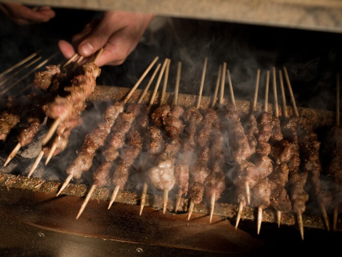  The Kebab Brothers prepare lamb kebabs with cumin and charcoal.