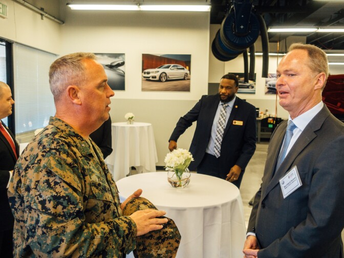 Brigadier General Kevin Killea (left) and Bernhard Kuhnt, CEO of BMW of North America.