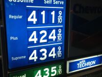 The Labor Department said Tuesday that U.S. consumer prices rose slightly in May as higher energy costs were partly offset by cheaper food. The small increase underscores that inflation is mild (Recent gas prices in Newport Beach, Calif.)