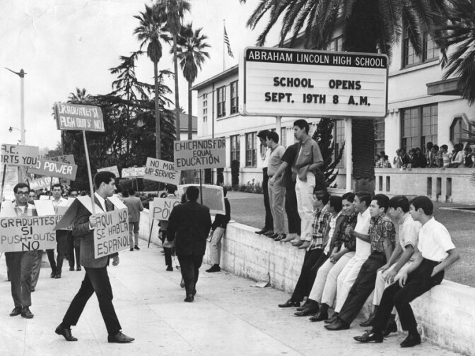 Nearly two full years before the walkouts, eighteen demonstrators picketed in front of Lincoln High School in 1966 to protest against the lack of counseling services and educational opportunities for Latino students.