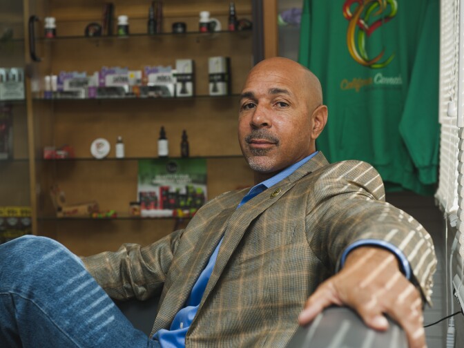 Marijuana mogul Virgil Grant poses for a portrait at Med X, a dispensary in Westmont that he owns, on Friday, Dec. 1, 2017.