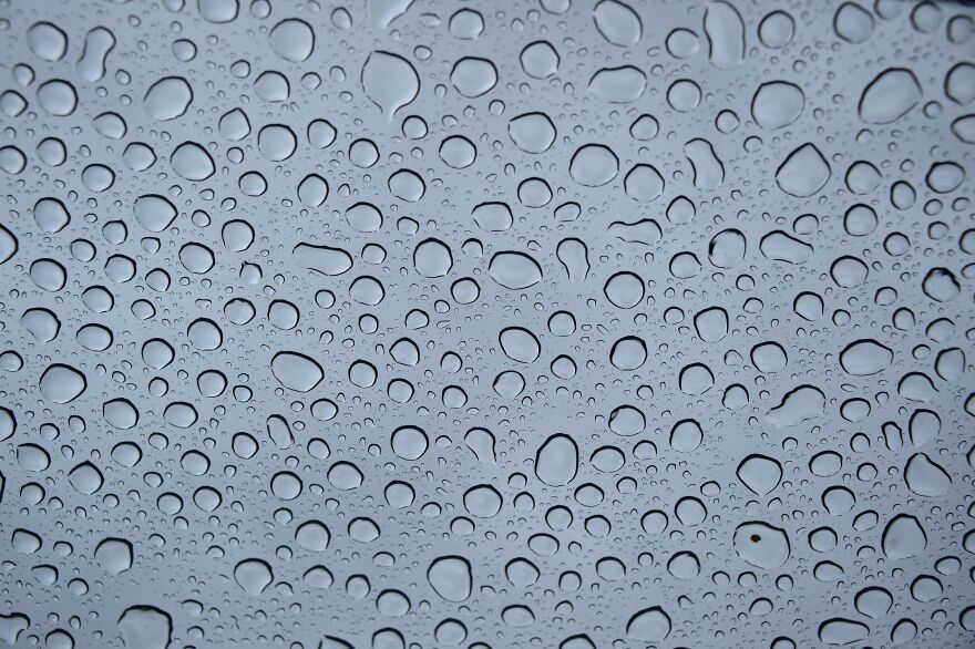 File: Raindrops are seen on the sunroof of a vehicle as the strongest storm in six years slammed Southern California, in Pasadena on Feb. 17, 2017.