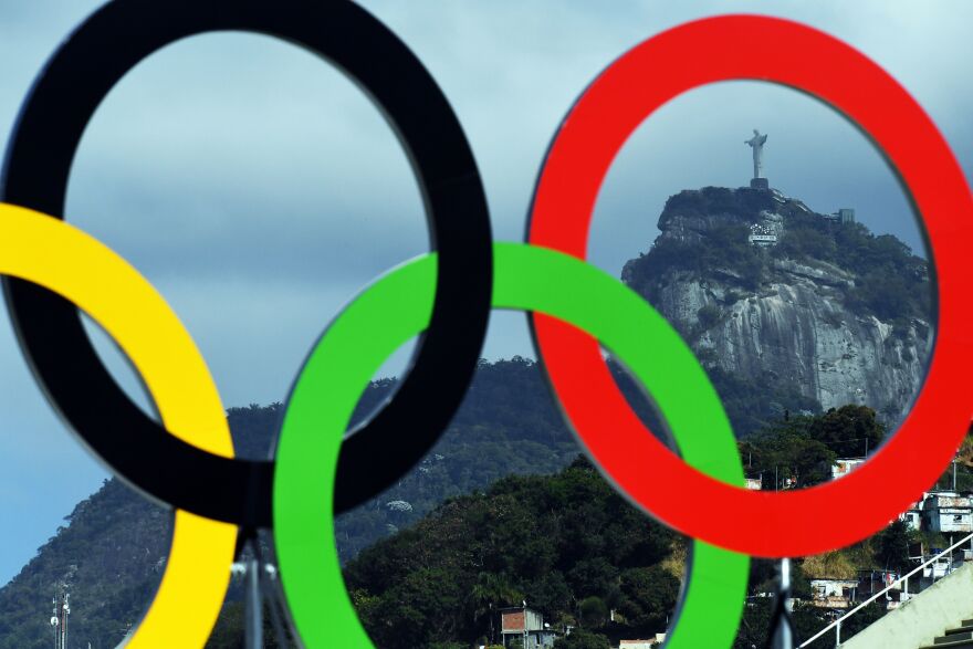 The Christ the Redeemer statue is seen through a set of Olympic rings at the Sambodromo archery venue in Rio de Janeiro on August 4, 2016 on the eve of the opening of the Rio 2016 Olympic Games. 

 / AFP / Jewel SAMAD        (Photo credit should read JEWEL SAMAD/AFP/Getty Images)