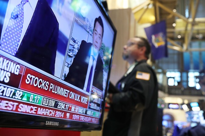NEW YORK, NY - JUNE 24:  Traders work on the floor of the New York Stock Exchange (NYSE) following news that the United Kingdom has voted to leave the European Union on June 24, 2016 in New York City. The Dow Jones industrial average quickly fell nealy 500 points on the news with markets around the globe plunging.  (Photo by Spencer Platt/Getty Images)