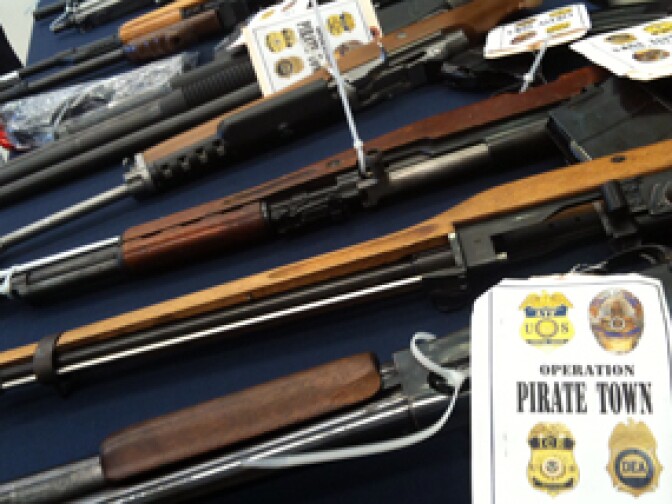 Police and federal officers arrested 80 alleged members of Rancho San Pedro gang whose members officials say trafficked guns and sold large amounts of drugs.