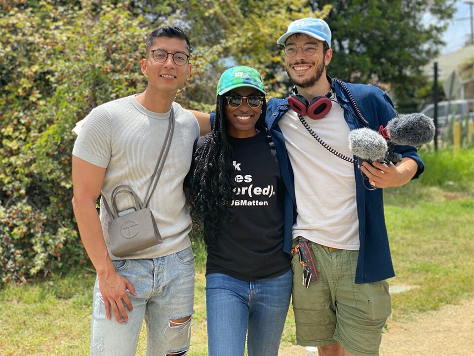 The three producers of How To LA stand next to each other to pose in a picture. 