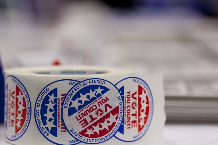 Volunteers gave about stickers to newly naturalized American citizens after they registered to vote.