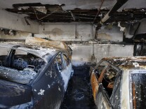 Cars that were burned in a spree of arson fires lie in ruins in Los Angeles Jan. 2.