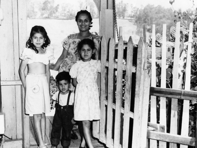 1951: "The Navarro family pose at their Chavez Ravine home before their relocation to the William Mead Homes Housing Project. Blasito Navarro (divorced) lived with her 3 children in this 5 room house, which rented for $25 per month." Courtesy of the Los Angeles Public Library