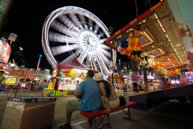File: Visitors attend the Los Angeles County Fair 2013 in Pomona, California on Sept. 4, 2013.