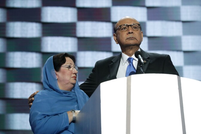 PHILADELPHIA, PA - JULY 28:  Khizr Khan, father of deceased U.S. Army Capt. Humayun S. M. Khan, delivers remarks as he is joined by his wife Ghazala Khan on the fourth day of the Democratic National Convention at the Wells Fargo Center, July 28, 2016 in Philadelphia, Pennsylvania. Democratic presidential candidate Hillary Clinton received the number of votes needed to secure the party's nomination. An estimated 50,000 people are expected in Philadelphia, including hundreds of protesters and members of the media. The four-day Democratic National Convention kicked off July 25. (Photo by Joe Raedle/Getty Images)