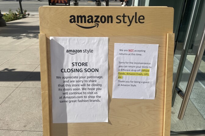 Signs posted outside an Amazon Style store saying "store closing soon" as well as a notice that the store is not accepting returns.