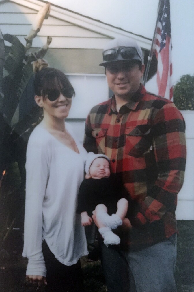 Rachel and Anthony Powers with their new baby Elvis. Anthony missed his first Fathers' Day, because he had to fight back flames. 