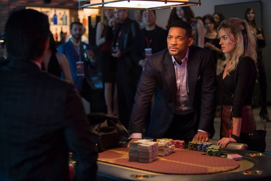 Will Smith (left) and Margot Robbie (right) star in the heist drama "Focus" -- the latest flop in Smith's movie canon. 