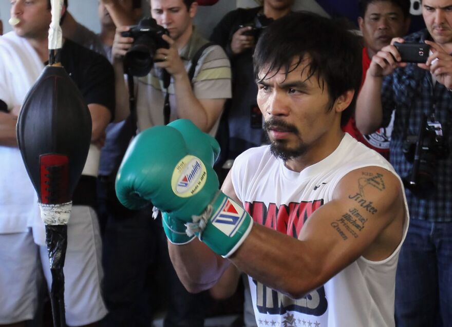 HOLLYWOOD, CA - APRIL 20:  Manny Pacquiao of the Philippines trains on the speed bag during a media workout at the Wild Card Boxing Club on April 20, 2011 in Hollywood, California.  (Photo by Jeff Gross/Getty Images) *** Local Caption *** Manny Pacquiao;